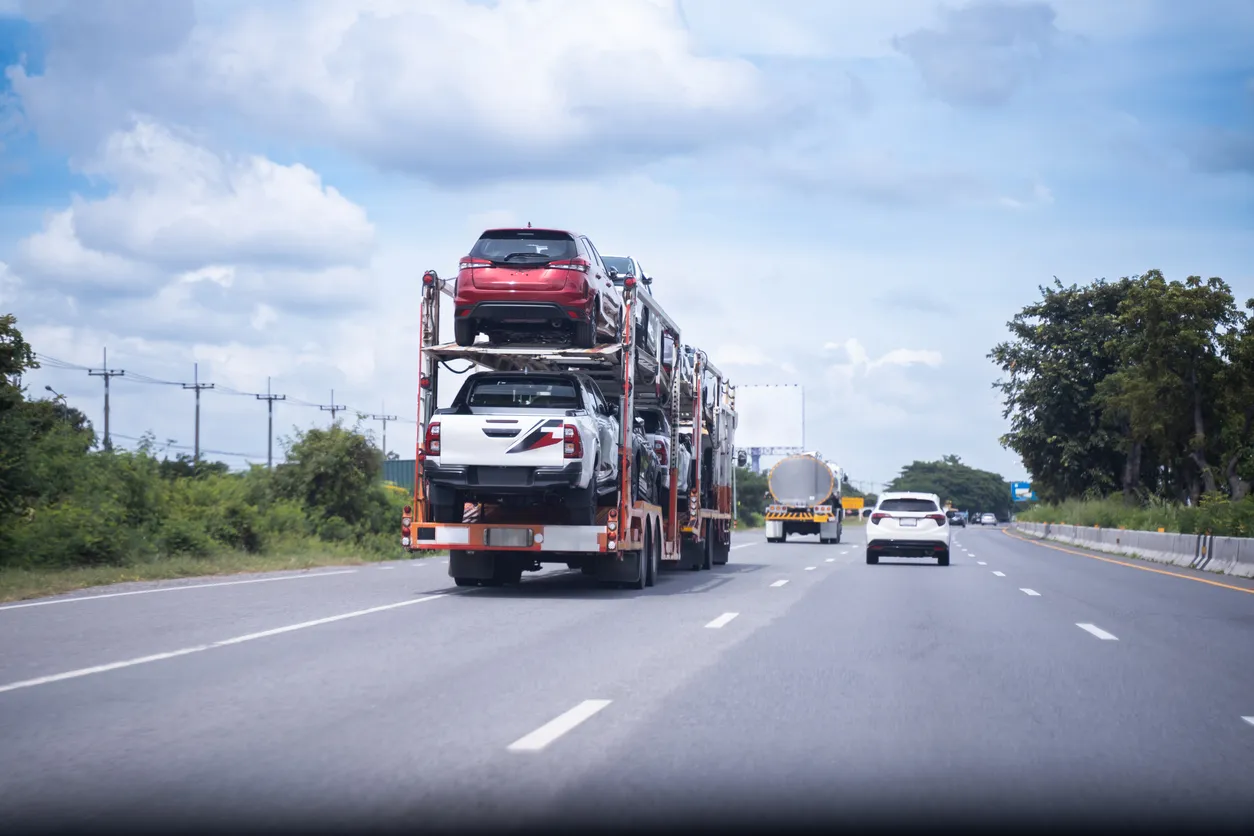 Car transporter truck transporting vehicles in Mississippi