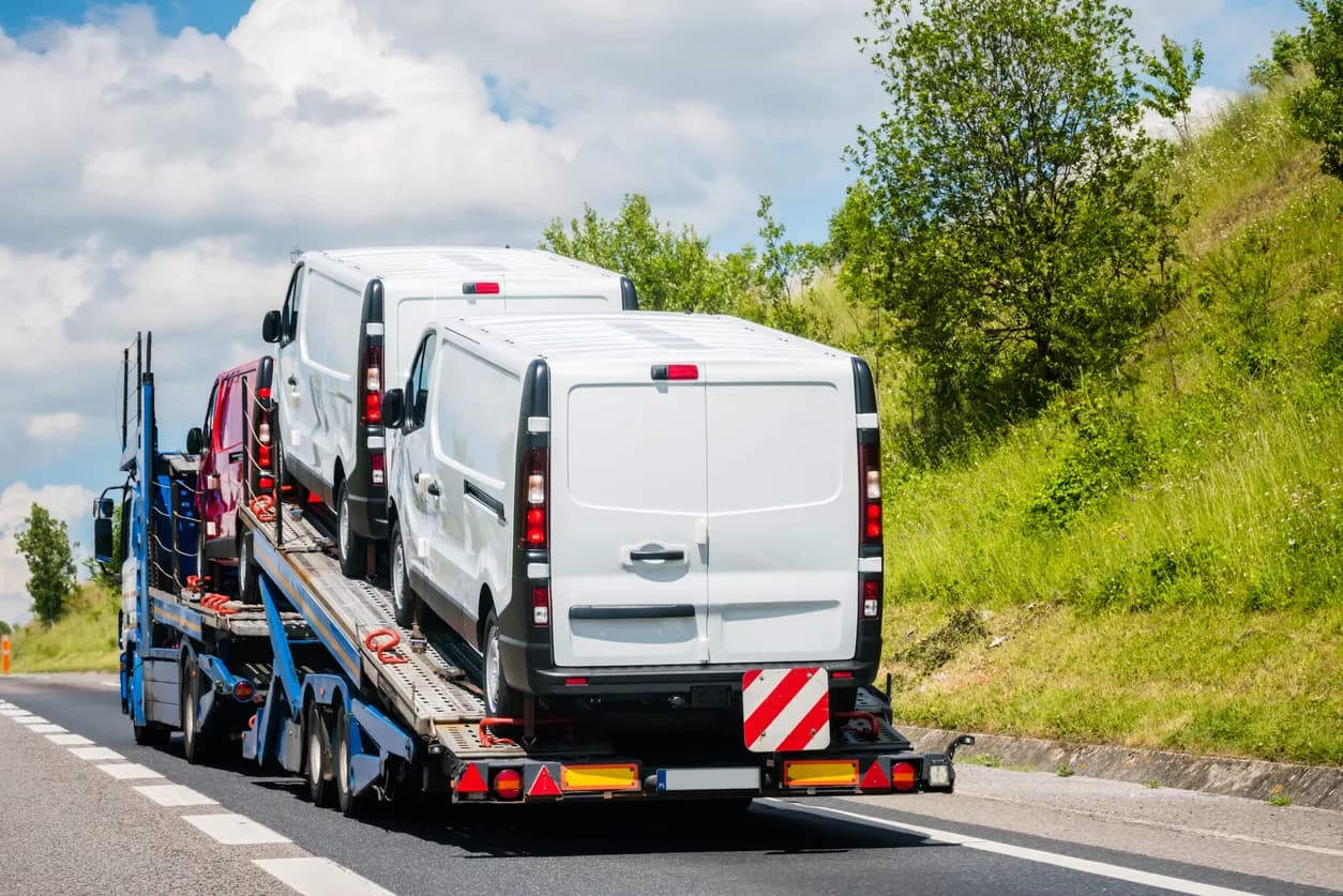 Car transporter truck transporting vehicles in Montana