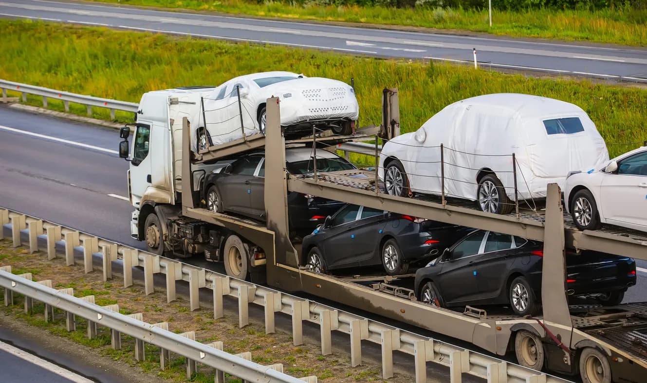 Car transporter truck transporting vehicles in New Jersey