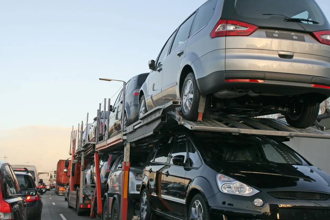 Car transporter truck transporting vehicles in South Dakota