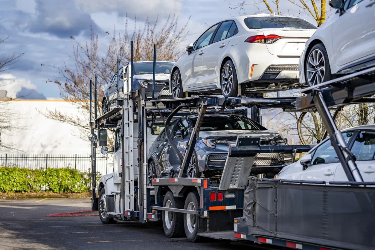 Car transporter truck transporting vehicles in Vermont