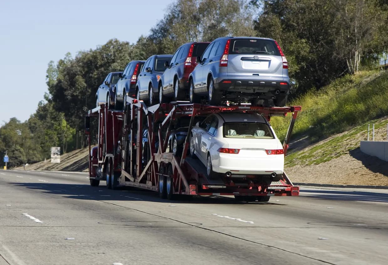 Car transporter truck transporting vehicles in West Virginia