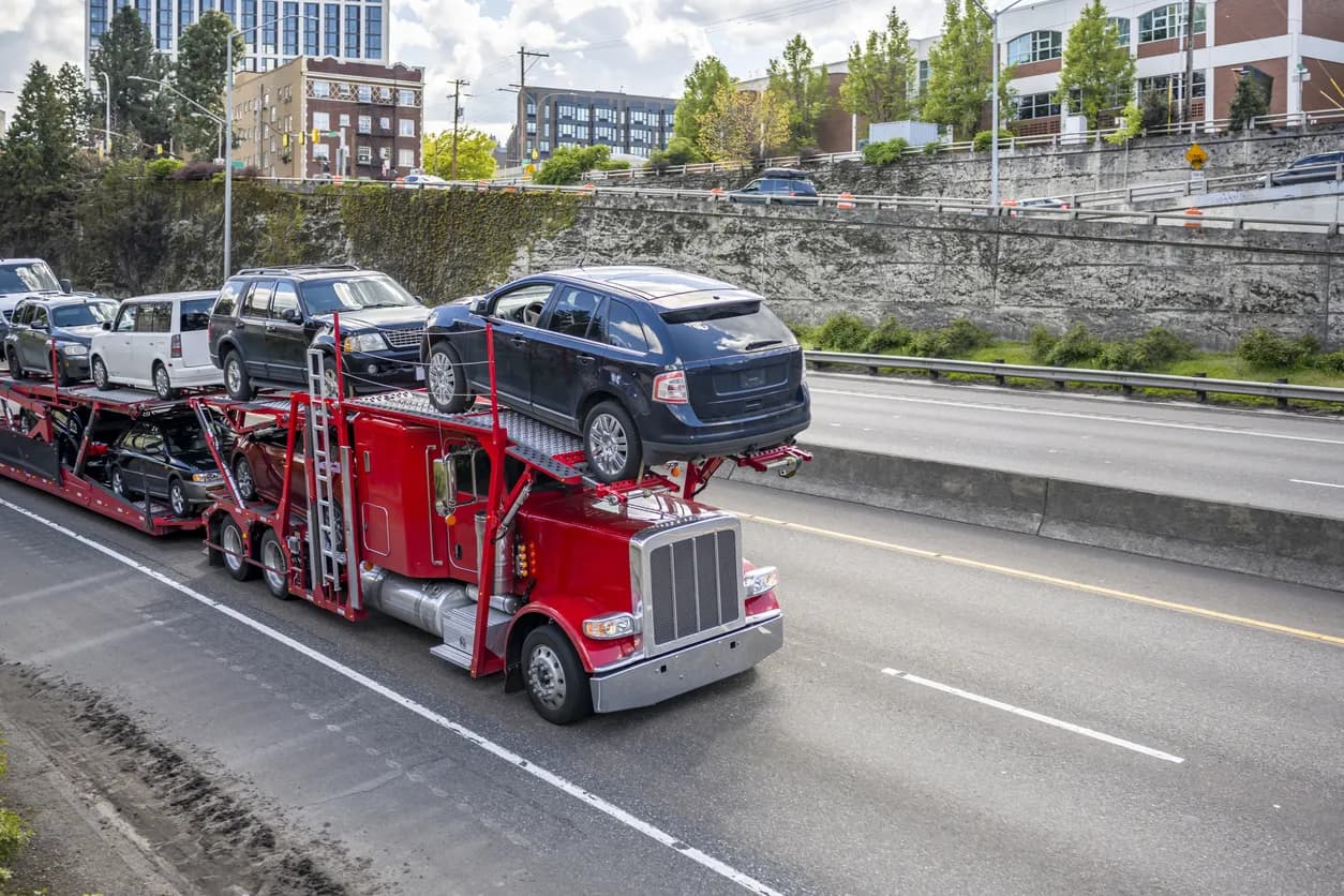 Car transporter truck transporting vehicles in New Mexico